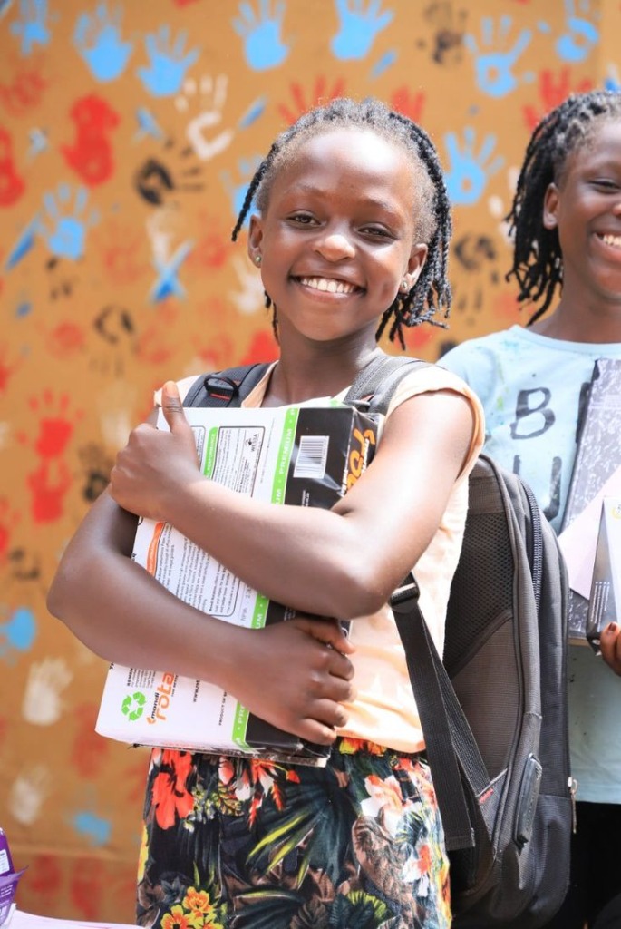 A joyful His Kids High School student ready to learn